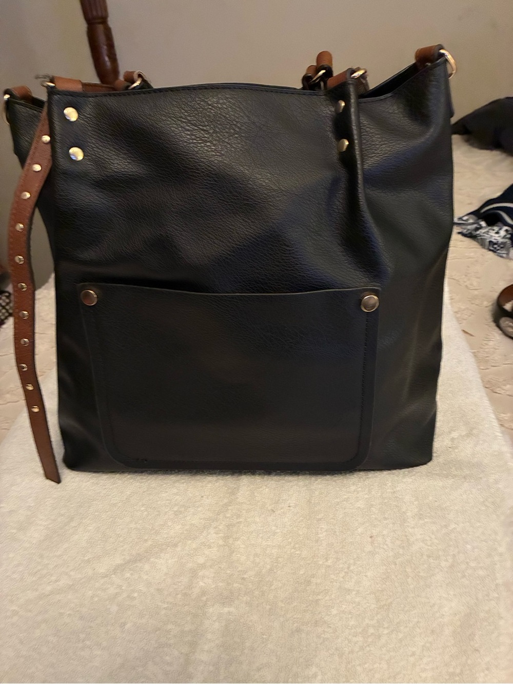 Pre-owned Black Faux Leather Tote with Brown Studded Strap, deep inside. Travel